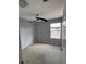 Neutral bedroom features a window for natural light, ceiling fan and is freshly painted at 14531 Pleach St, Winter Garden, FL 34787