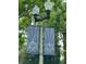Attractive community light post featuring decorative banners and mature landscaping at 14531 Pleach St, Winter Garden, FL 34787
