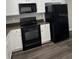 Modern kitchen equipped with stainless steel appliances and white cabinetry at 14531 Pleach St, Winter Garden, FL 34787
