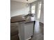 Stylish kitchen island featuring a sink and granite counters perfect for entertaining and meal preparation at 14531 Pleach St, Winter Garden, FL 34787