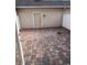 Private brick patio with access to a door and a white fence for outdoor enjoyment at 14531 Pleach St, Winter Garden, FL 34787