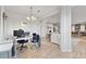 Open floor plan showcasing the office, living room, and kitchen at 15358 Arcadia Bluff Loop, Winter Garden, FL 34787