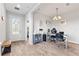 Bright office space with two desks, wood-look tile flooring, and ample natural light at 15358 Arcadia Bluff Loop, Winter Garden, FL 34787
