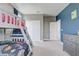 This bedroom's design showcases neutral tones, complemented by a spacious closet for an organized, calming space at 15378 Gilligan Ct, Winter Garden, FL 34787