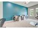 Bright office featuring a large window, ceiling fan and tandem desk layout with modern decor at 15378 Gilligan Ct, Winter Garden, FL 34787
