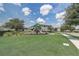 Community playground with slides and green space in a well-maintained neighborhood at 15378 Gilligan Ct, Winter Garden, FL 34787