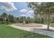 Community playground featuring modern play structures, and surrounding green space at 15378 Gilligan Ct, Winter Garden, FL 34787