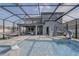 View of the pool area, including a slide, covered lanai, hammock and outdoor seating at 15378 Gilligan Ct, Winter Garden, FL 34787