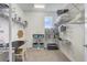 This walk-in closet has built-in shelving, an organizing system, and natural light at 15378 Gilligan Ct, Winter Garden, FL 34787