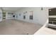 Large carport featuring secure storage cabinets and direct entry to the home at 1548 Challenger Ave, Davenport, FL 33897