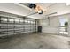 Spacious garage with a door to the outside, perfect for parking and storage at 1548 Challenger Ave, Davenport, FL 33897