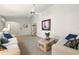 Bright living room with natural light and neutral tones creating a cozy atmosphere at 1548 Challenger Ave, Davenport, FL 33897