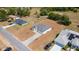Expansive aerial view of home showcasing new lawn and surrounding properties, highlighting the neighborhood layout at 16655 Sw 43Dr Terrrace Rd, Ocala, FL 34473