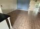 Spacious living room featuring tile floors and neutral wall colors at 1675 Louis Dr, Kissimmee, FL 34758