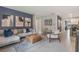 Open-concept living room with modern decor and comfortable seating at 1830 Escobar Ave, Deltona, FL 32725