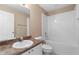 Clean bathroom with a large vanity, combined shower and tub, and classic fixtures at 2104 E Parkton Dr, Deltona, FL 32725
