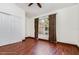 Bedroom with hardwood floors and natural light at 22619 State Road 44, Eustis, FL 32736