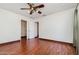 Bedroom features wood-look floors and a walk-in closet at 22619 State Road 44, Eustis, FL 32736