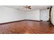 Bright open living room with hardwood floors and natural light at 22619 State Road 44, Eustis, FL 32736