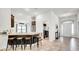 Modern kitchen features stainless steel appliances and breakfast bar with stool seating at 228 Bergamot Loop, Davenport, FL 33837