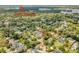 Aerial view of a neighborhood with mature trees and lush landscaping at 2407 Lafayette Ave, Winter Park, FL 32789