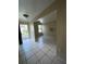 Living Room with tile flooring, light-colored walls, and a view out the front door at 2414 E Orange Ave, Eustis, FL 32726