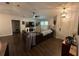 Comfortable living room with hardwood floors, a leather couch, and contemporary decor at 243 Country Landing Blvd, Apopka, FL 32703