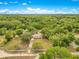 Enjoy privacy and nature in this peaceful wooded neighborhood, featuring a spacious lot with a single Gathering home at 2550 Barren Oak Ct, Deland, FL 32720