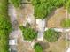 Bird's eye view of a home with a long driveway, surrounded by trees and a spacious yard at 2550 Barren Oak Ct, Deland, FL 32720