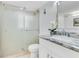 Bathroom with a glass-enclosed shower, marble countertops, and white cabinetry at 2550 Barren Oak Ct, Deland, FL 32720