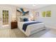 Bright bedroom with a comfortable king-size bed and large window, creating a serene retreat at 2550 Barren Oak Ct, Deland, FL 32720