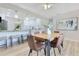Elegant dining area with stylish furnishings and seamless flow to the adjacent kitchen at 2550 Barren Oak Ct, Deland, FL 32720