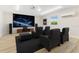 Dedicated home theater with plush seating and a large screen for immersive entertainment at 2550 Barren Oak Ct, Deland, FL 32720