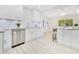 Modern kitchen featuring granite countertops, stainless steel appliances, and ample cabinet space at 2550 Barren Oak Ct, Deland, FL 32720