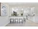 Well-lit kitchen with barstool seating, pendant lighting and stainless steel appliances at 2550 Barren Oak Ct, Deland, FL 32720