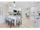 Modern kitchen with granite counters, stainless steel appliances, and breakfast bar seating at 2550 Barren Oak Ct, Deland, FL 32720
