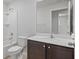 Bathroom features white toilet and countertop at 269 Fig Ct, Kissimmee, FL 34759