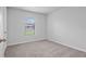 Bedroom with carpet and a window at 269 Fig Ct, Kissimmee, FL 34759