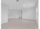 Open-concept room with tile flooring, neutral walls, and ample space for furniture at 269 Fig Ct, Kissimmee, FL 34759