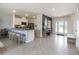 Welcoming foyer with white door, a view of the staircase and an entryway table at 2710 Golden Trout Ln, Edgewater, FL 32141