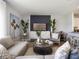 Stylish living room featuring a decorative wall, modern furniture, and natural light at 2710 Golden Trout Ln, Edgewater, FL 32141