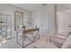 Bright home office featuring a desk, shelving, and comfortable seating at 279 Wisteria Ct, Deltona, FL 32738