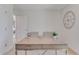 Home office featuring a modern desk, two chairs, and a decorative clock at 279 Wisteria Ct, Deltona, FL 32738