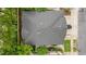 Birds-eye view of townhome highlighting roof, tidy landscaping, and convenient parking area at 2810 San Jacinto Cir # 2810, Sanford, FL 32771