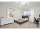 Bright bedroom featuring large windows, a gray bed, and neutral walls at 2810 San Jacinto Cir # 2810, Sanford, FL 32771