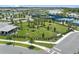 The community dog park offers a fenced area with benches, trees, and dog-friendly amenities at 2960 Cherry Blossom Loop, St Cloud, FL 34771