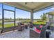 Relaxing screened lanai with comfortable seating and beautiful views of the pond at 2960 Cherry Blossom Loop, St Cloud, FL 34771