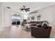 Spacious living room with sliding glass doors to the outdoor area, creating a seamless indoor-outdoor flow at 2960 Cherry Blossom Loop, St Cloud, FL 34771