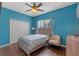 Bright bedroom featuring wood floors and closet at 322 Huron Dr, Kissimmee, FL 34759