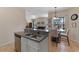Bright dining area adjacent to the kitchen, perfect for Gathering meals and entertaining guests at 322 Huron Dr, Kissimmee, FL 34759